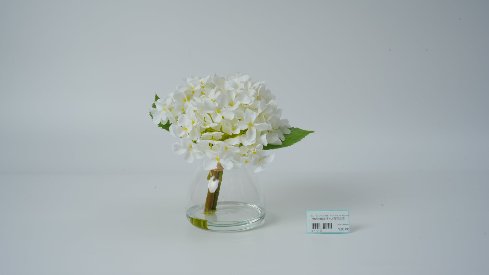 Clear Glass Vase with Faux Flower Arrangement