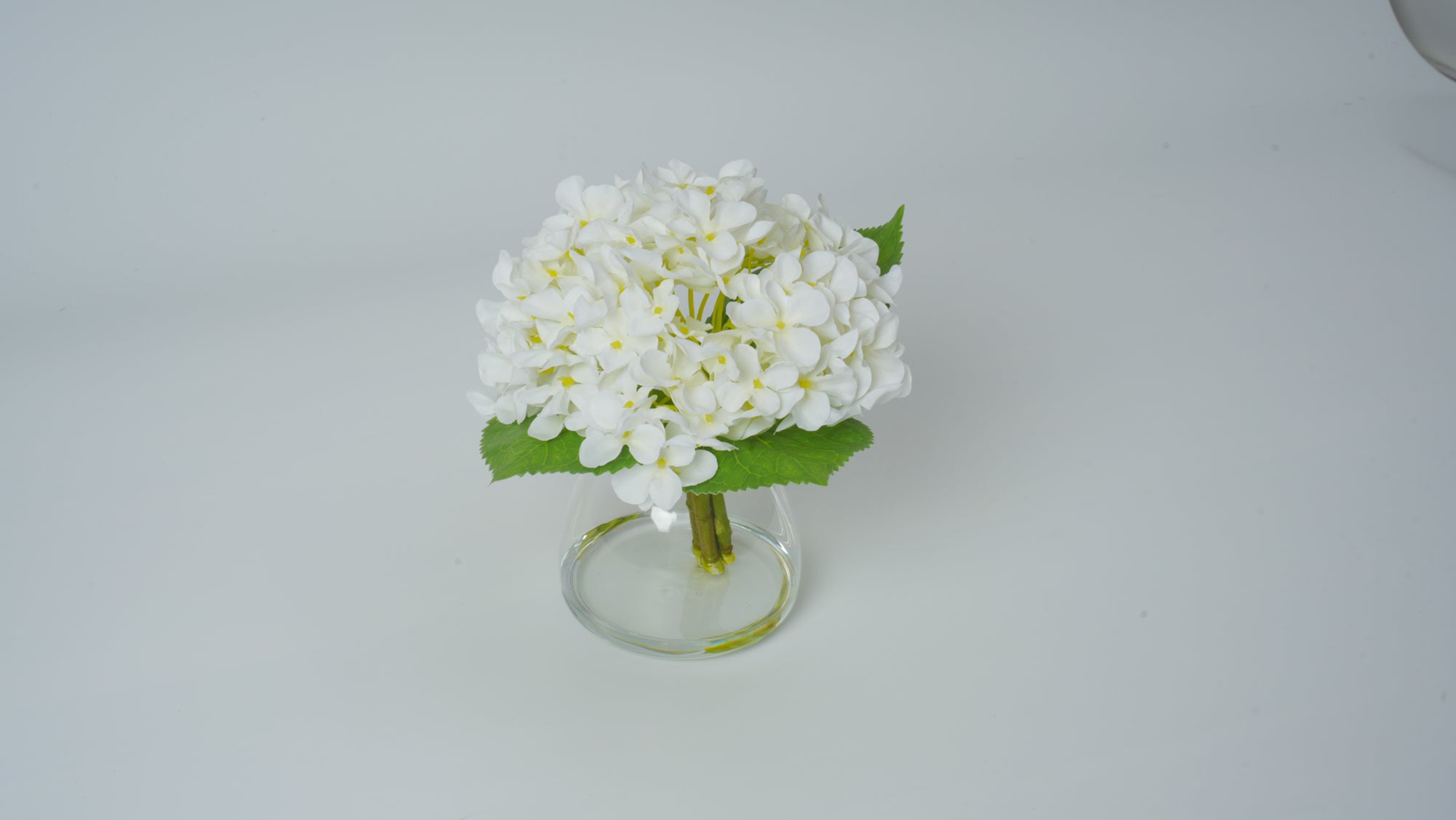 Clear Glass Vase with Faux Flower Arrangement