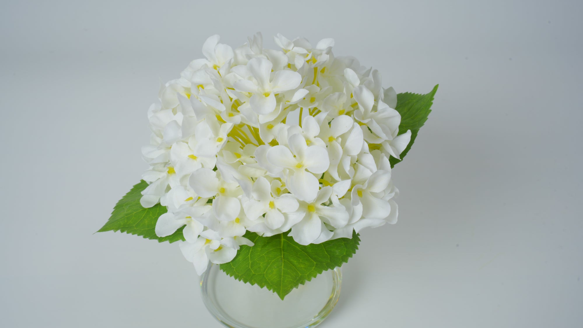 Clear Glass Vase with Faux Flower Arrangement