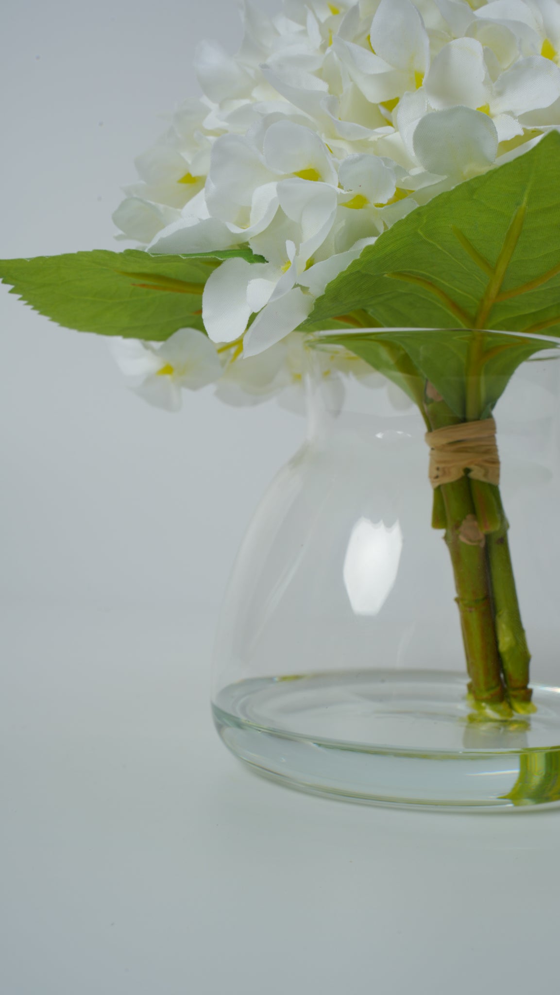 Clear Glass Vase with Faux Flower Arrangement