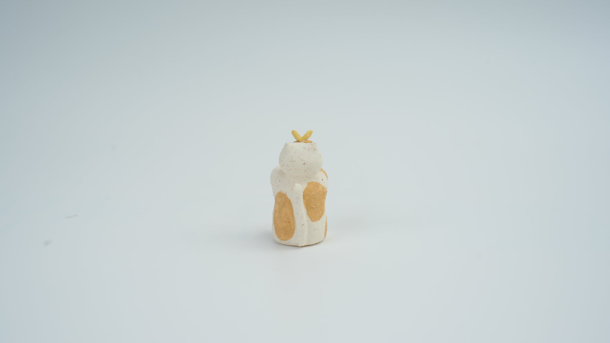 Small Animal Teasing Butterfly Figurine