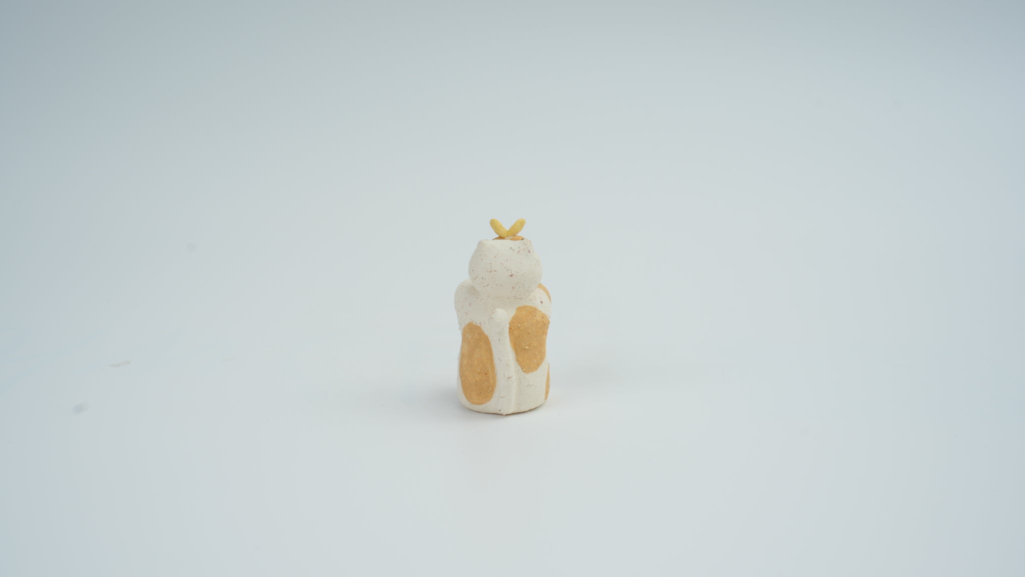 Small Animal Teasing Butterfly Figurine