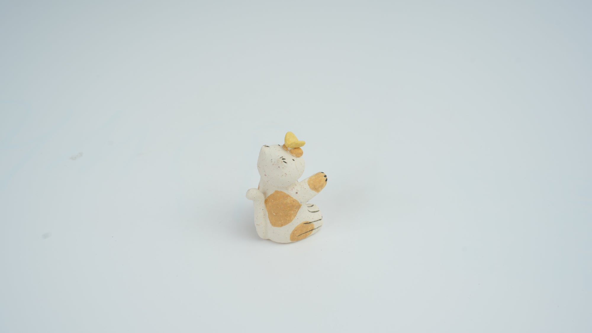 Small Animal Teasing Butterfly Figurine