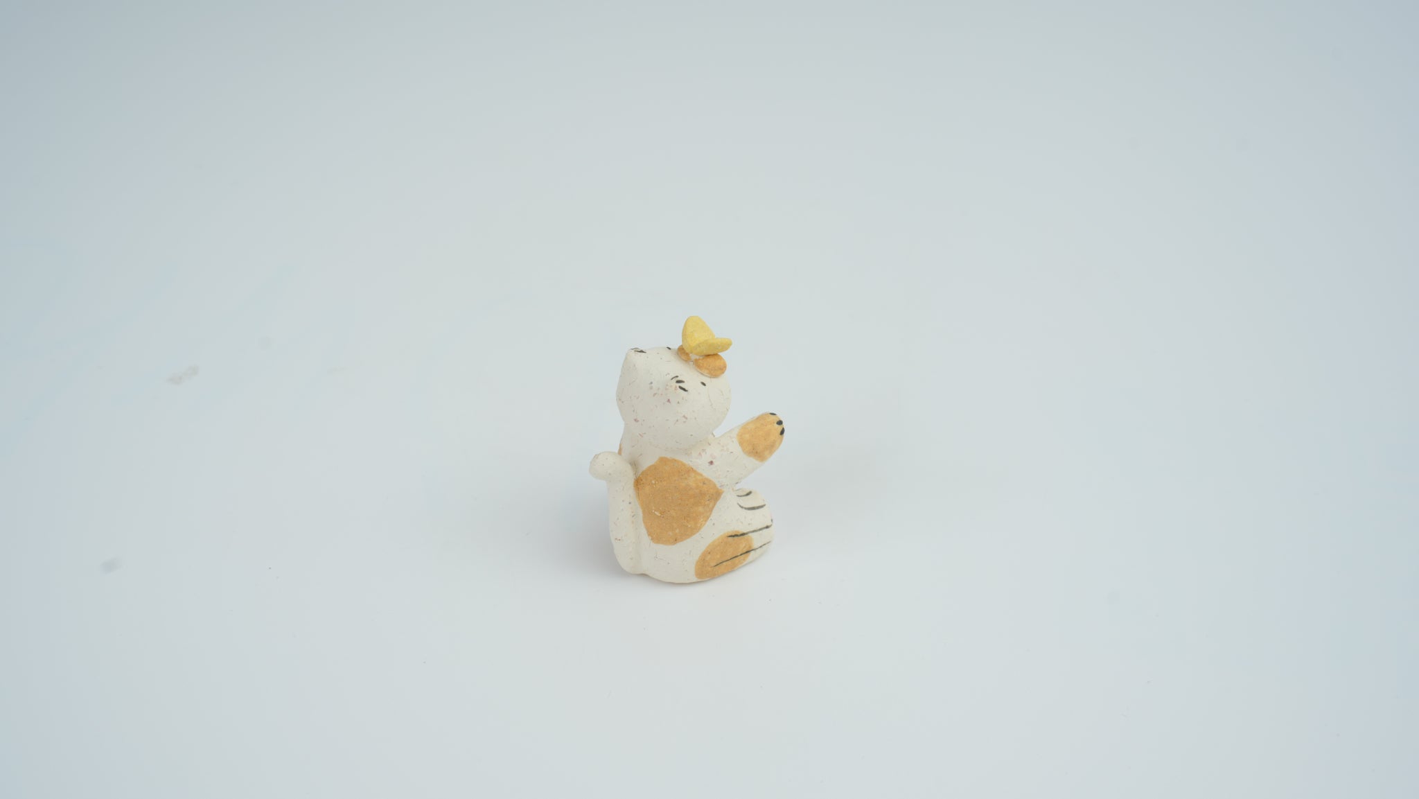 Small Animal Teasing Butterfly Figurine