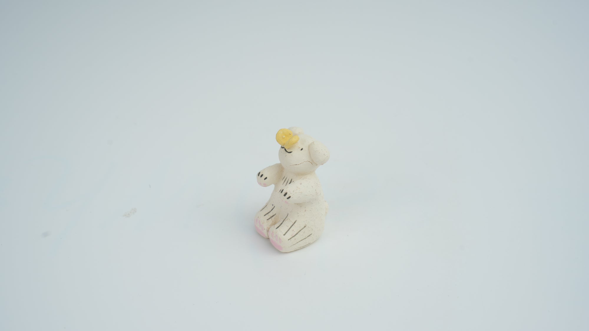Small Animal Teasing Butterfly Figurine