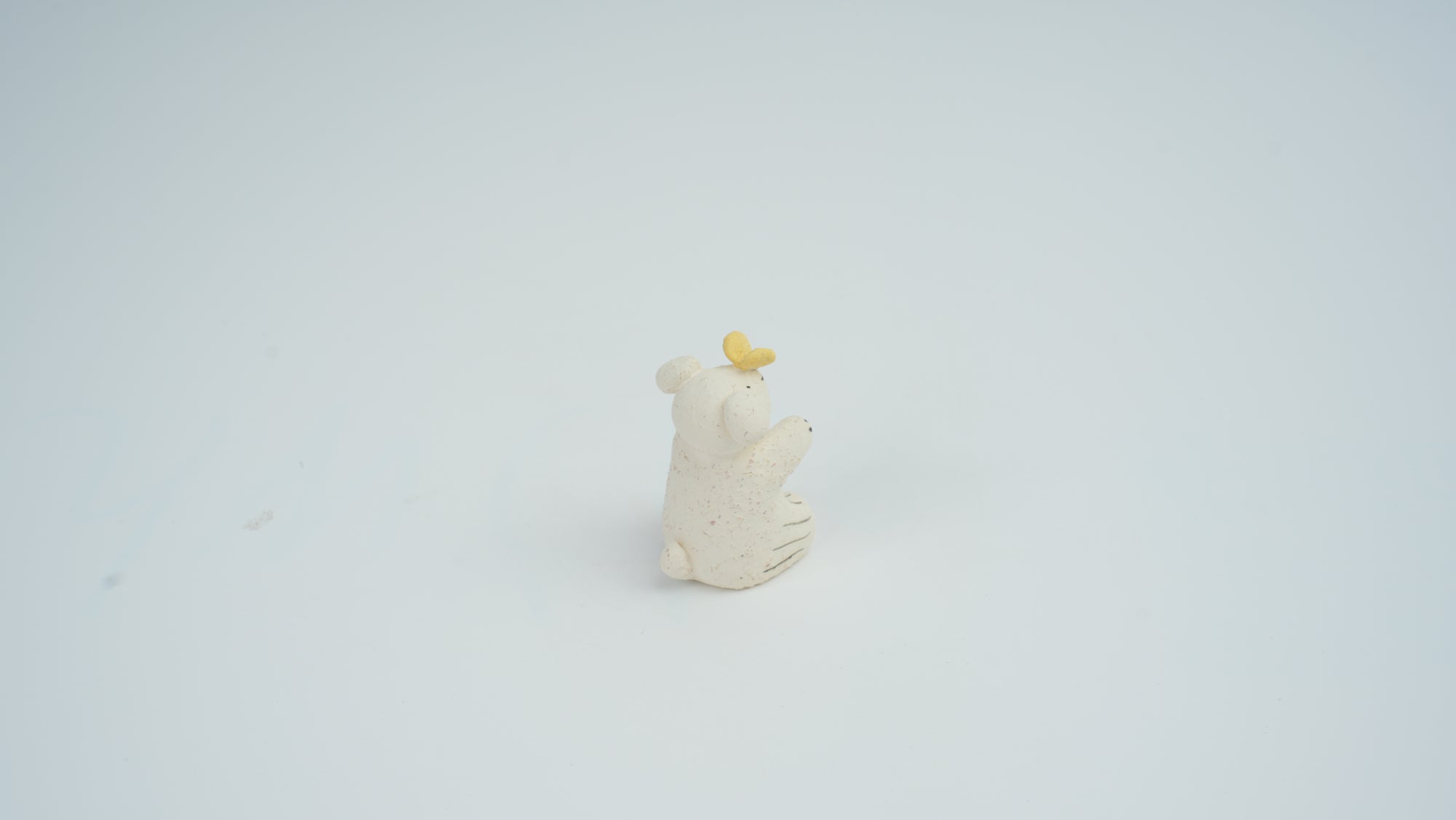 Small Animal Teasing Butterfly Figurine