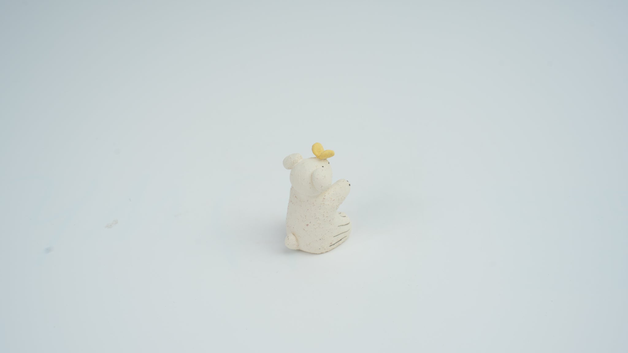 Small Animal Teasing Butterfly Figurine