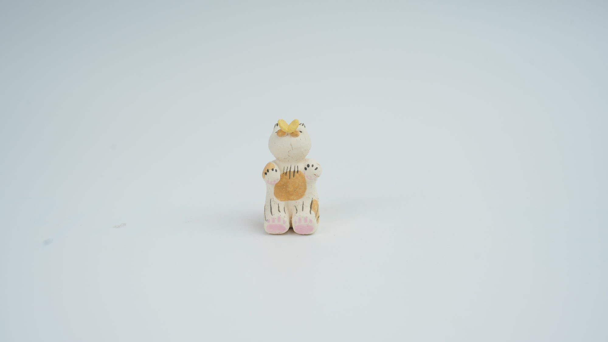 Small Animal Teasing Butterfly Figurine