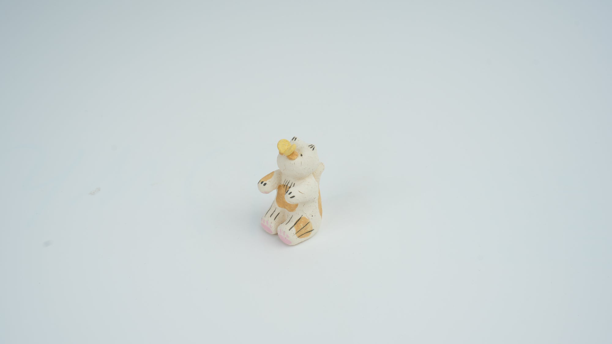 Small Animal Teasing Butterfly Figurine