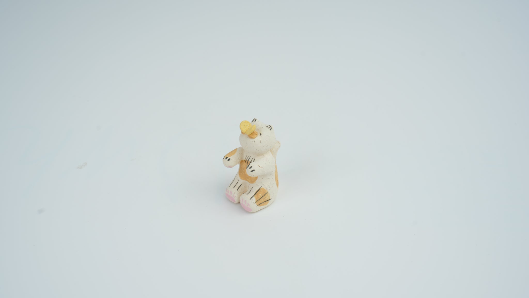 Small Animal Teasing Butterfly Figurine