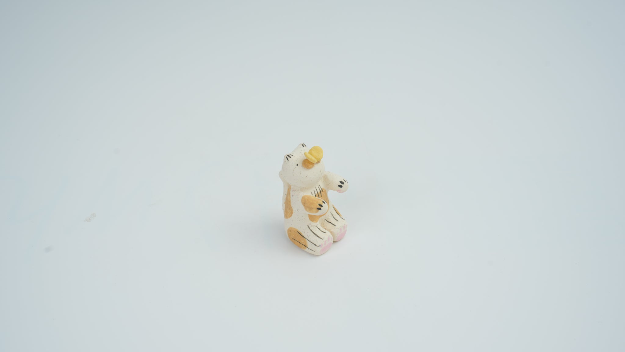 Small Animal Teasing Butterfly Figurine