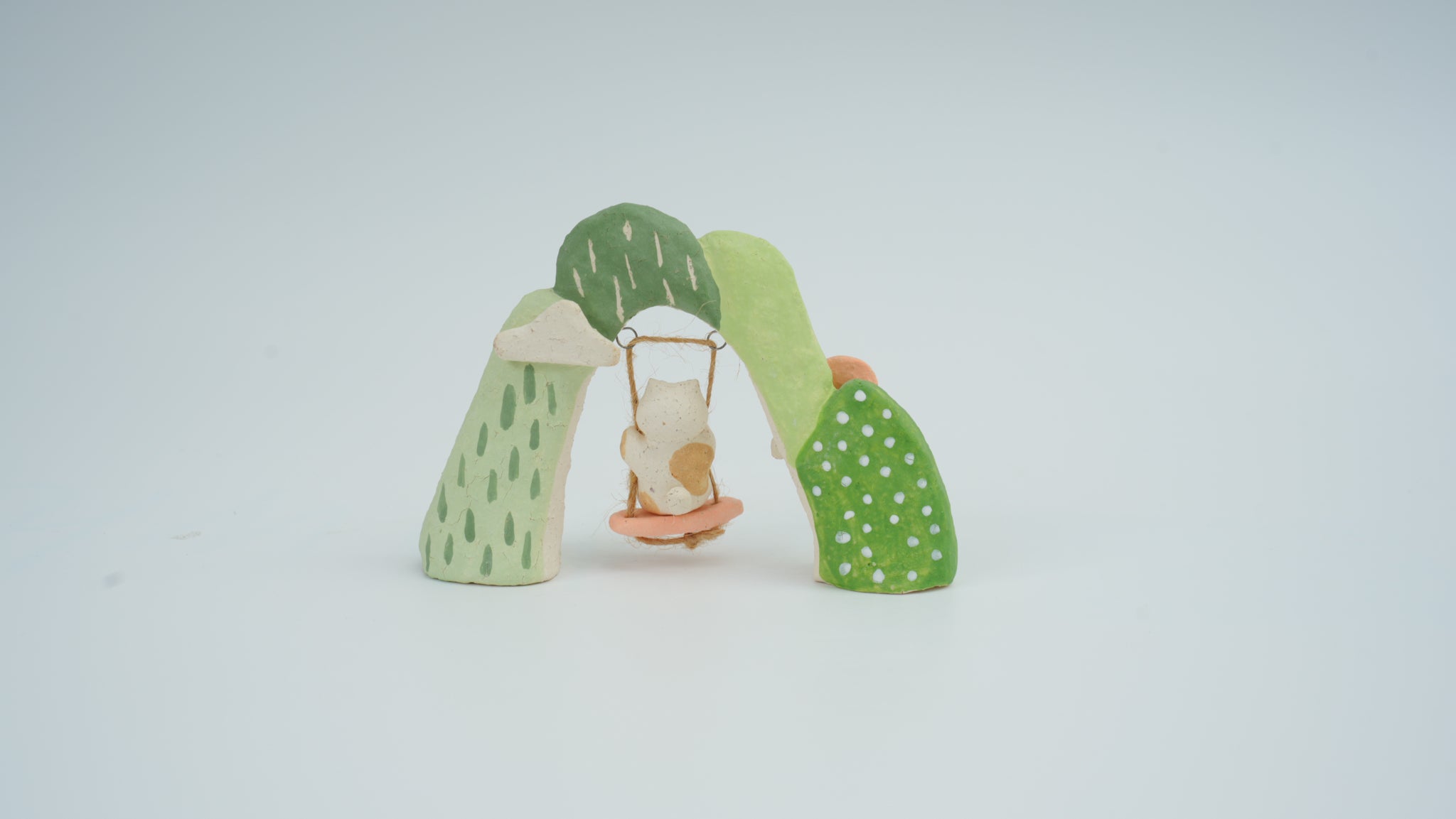 Small Animal on Swing Figurine