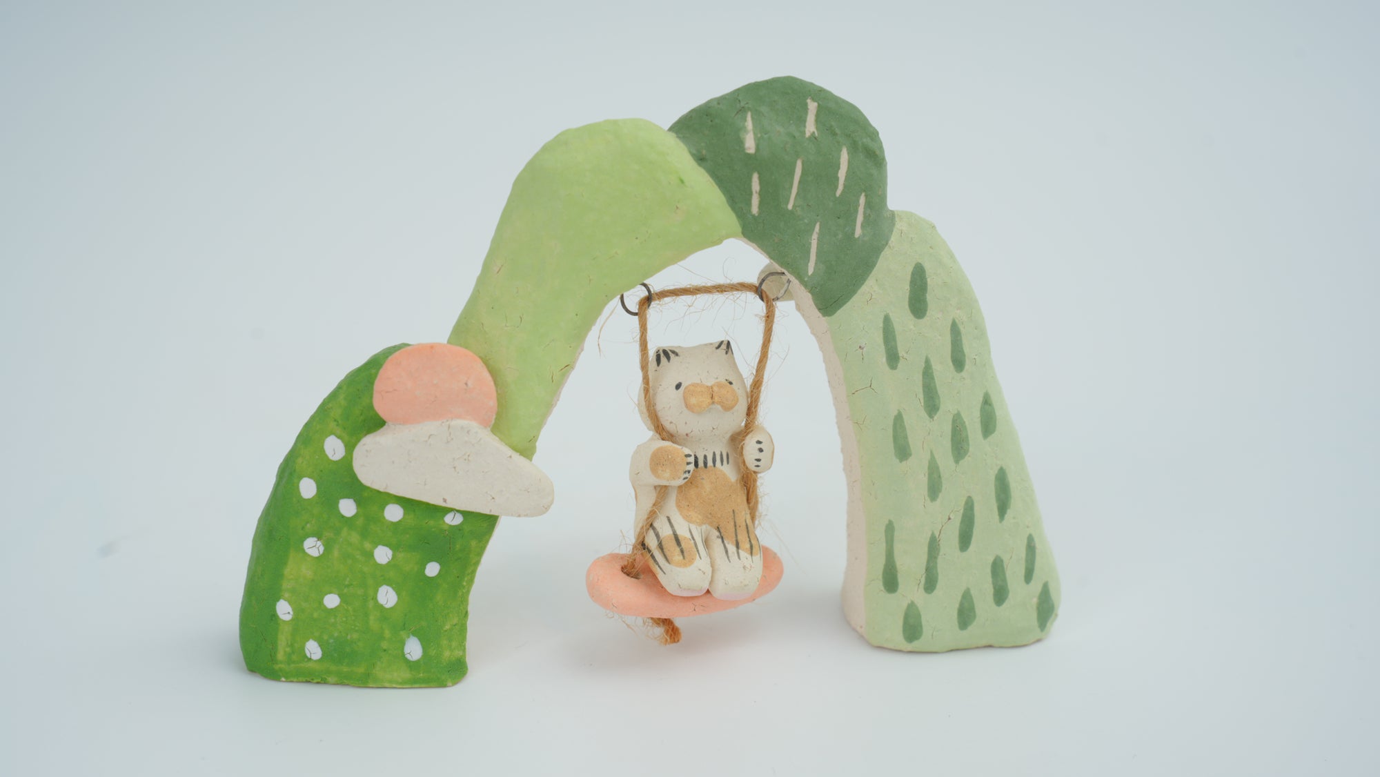 Small Animal on Swing Figurine