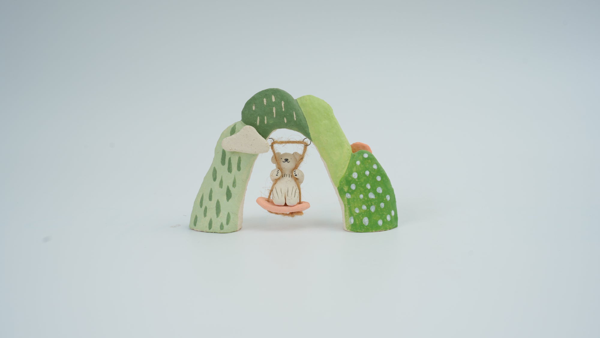 Small Animal on Swing Figurine