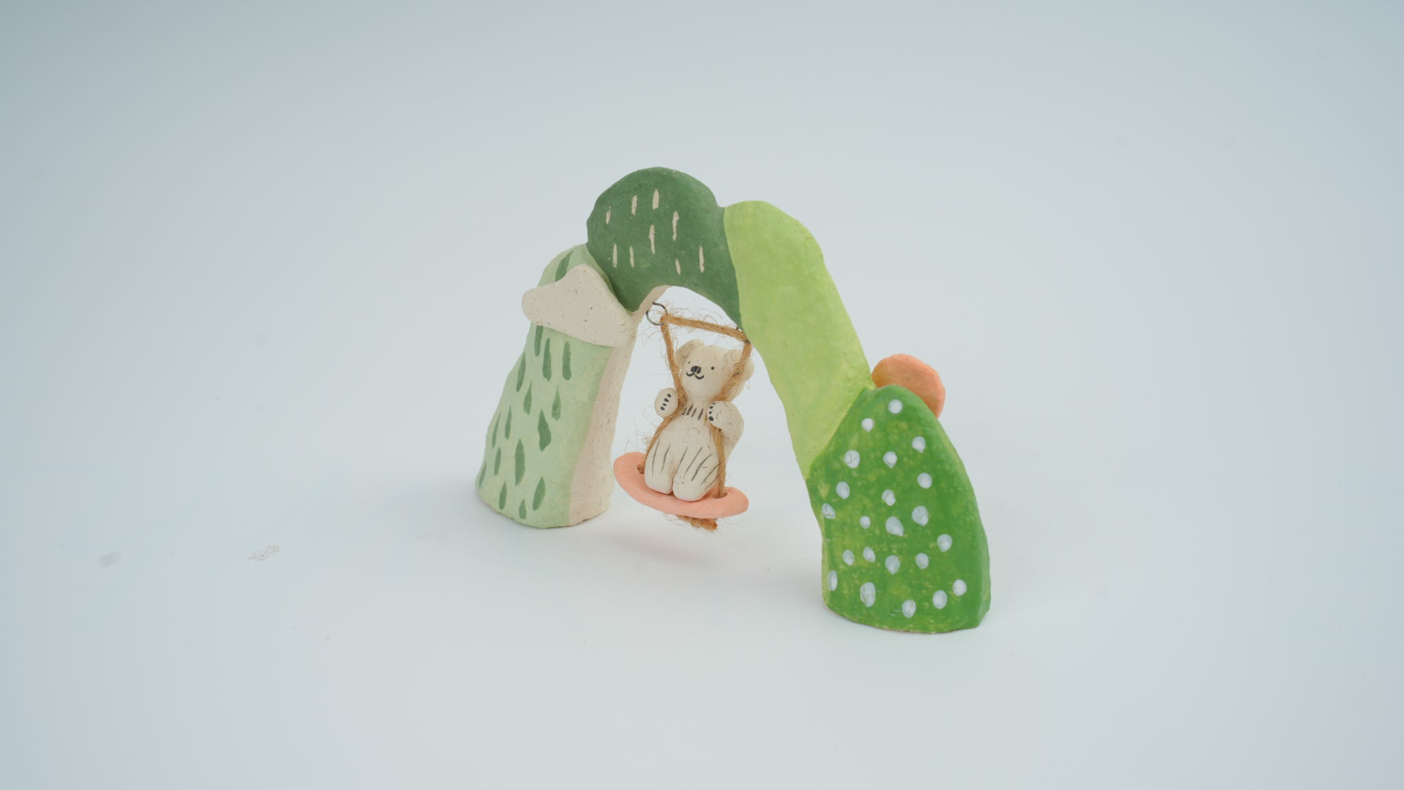 Small Animal on Swing Figurine