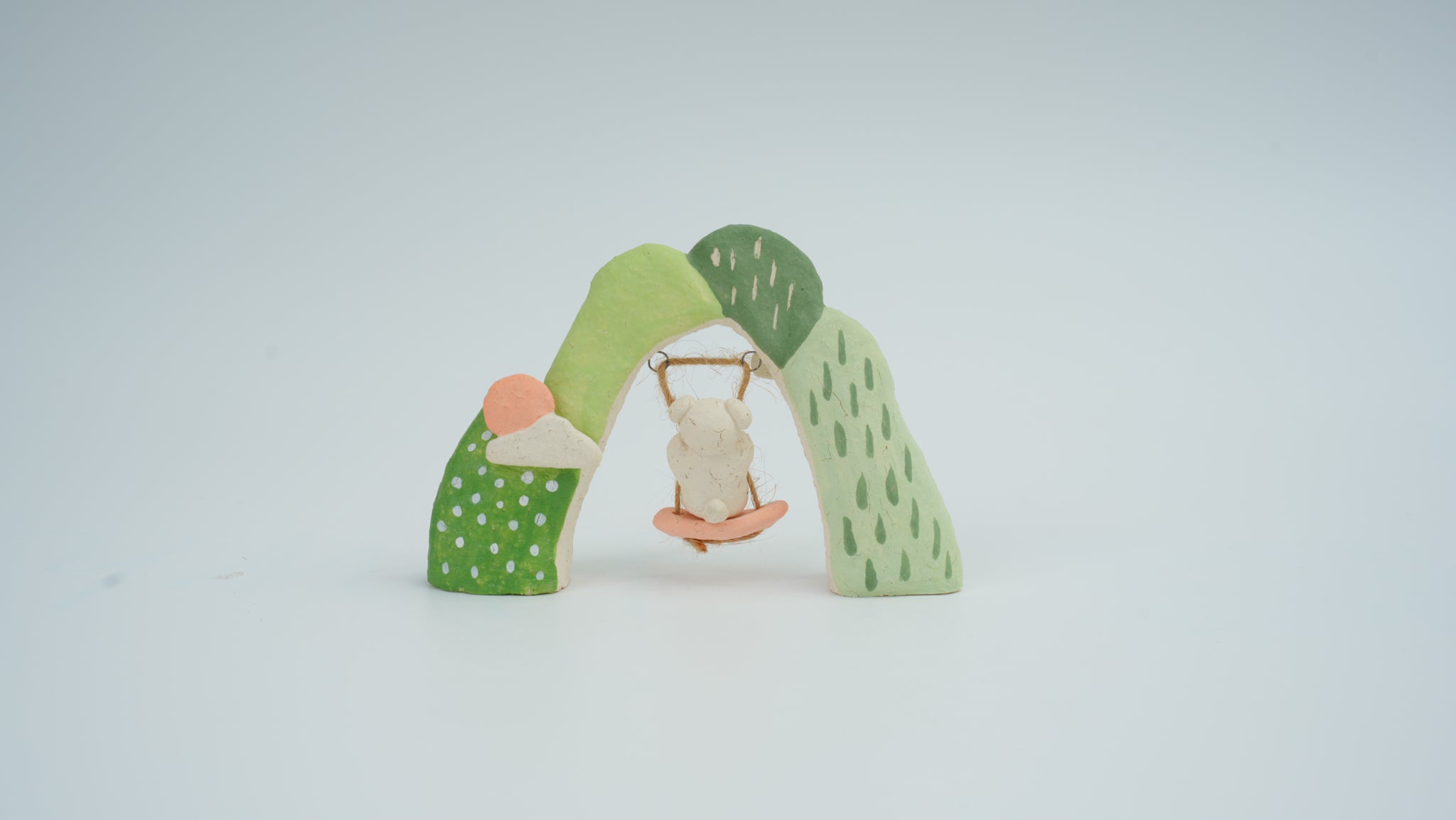 Small Animal on Swing Figurine