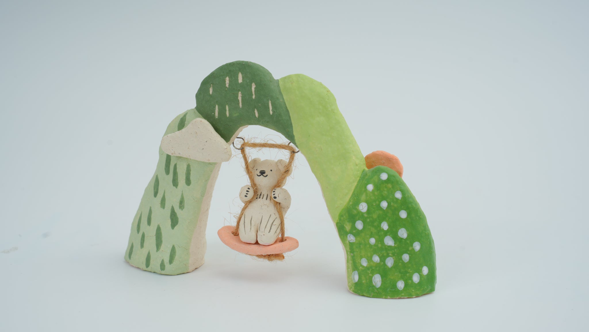 Small Animal on Swing Figurine