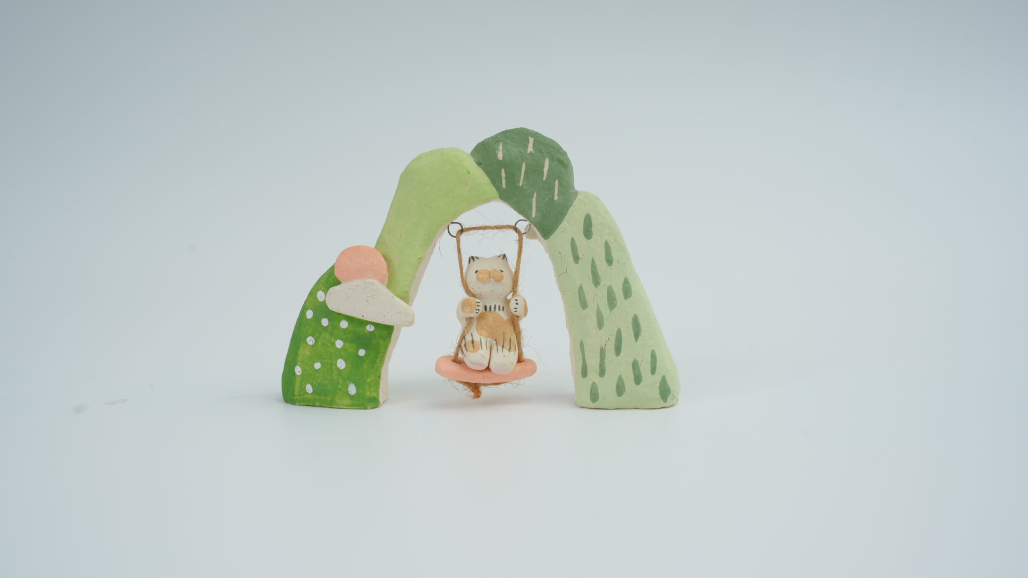 Small Animal on Swing Figurine