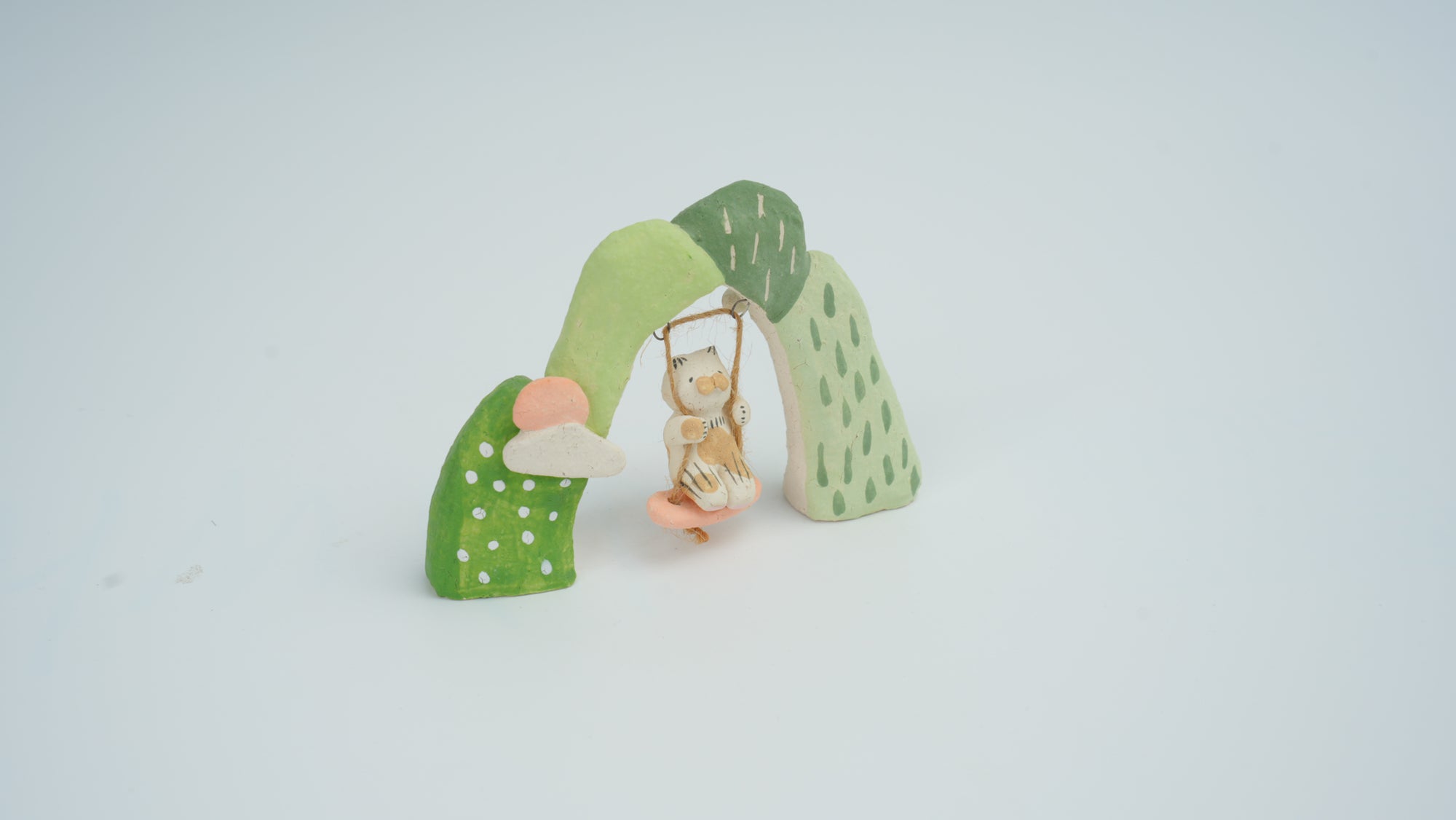Small Animal on Swing Figurine